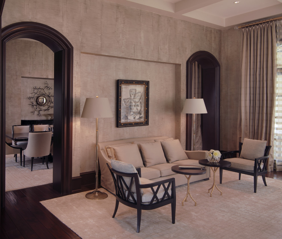 This is an example of a contemporary living room in Houston with grey walls.