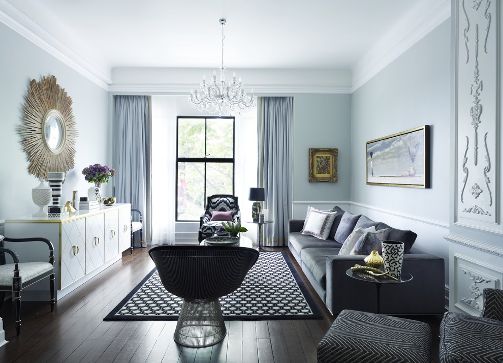 Esempio di un soggiorno design con pareti blu e nessuna TV