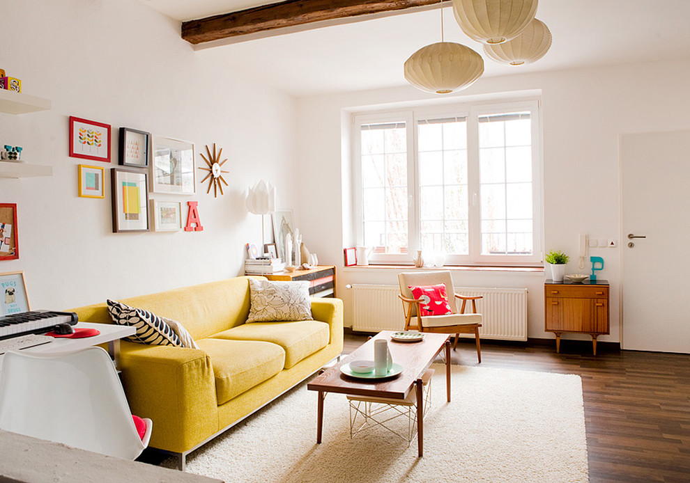 Inspiration for a scandinavian living room remodel in Other with white walls