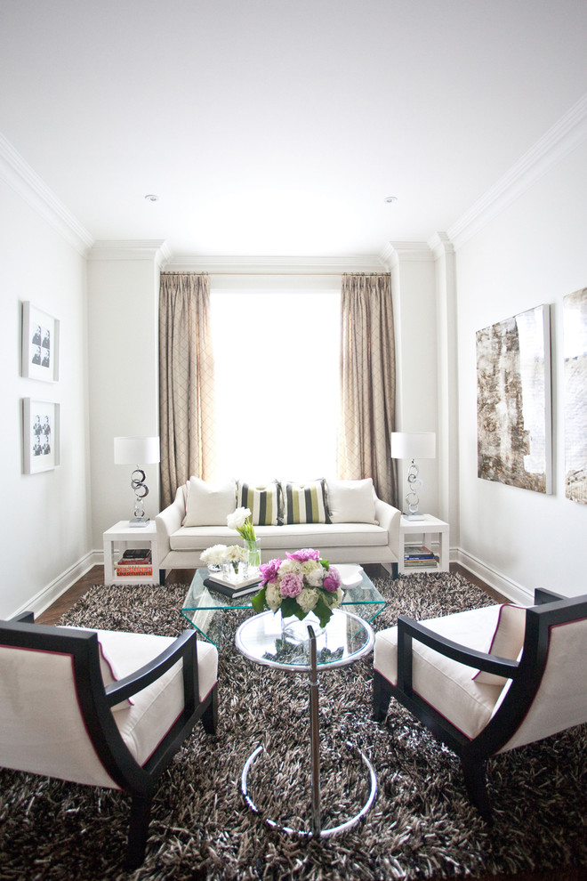 Living room - contemporary enclosed living room idea in Toronto with white walls, no fireplace and no tv
