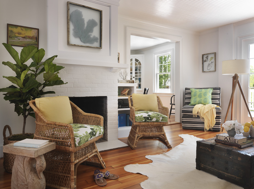 Beach style living room photo in Providence with white walls