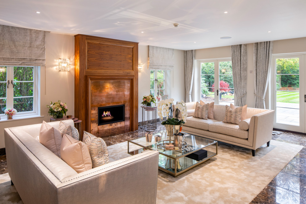 Design ideas for a large classic formal enclosed living room in Buckinghamshire with beige walls, carpet, a standard fireplace, a wooden fireplace surround, no tv and beige floors.