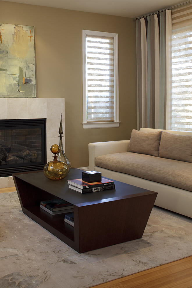Living room - contemporary living room idea in Dallas with a tile fireplace