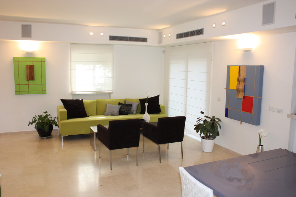 This is an example of a modern living room in Other with white walls.