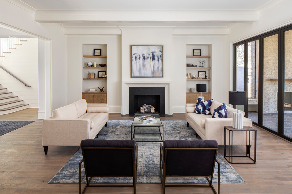 Living room - large transitional formal and open concept medium tone wood floor and brown floor living room idea in Charlotte with beige walls, a standard fireplace, a stone fireplace and no tv