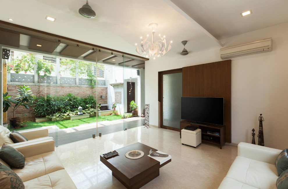 Design ideas for a contemporary living room in Bengaluru.