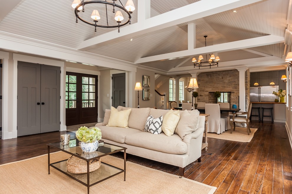 Inspiration for a large classic mezzanine living room in Raleigh with beige walls, dark hardwood flooring, no fireplace and no tv.