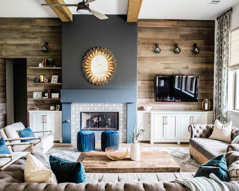 Inspiration for a medium sized contemporary formal enclosed living room in Austin with multi-coloured walls, medium hardwood flooring, a standard fireplace, a metal fireplace surround and a wall mounted tv.