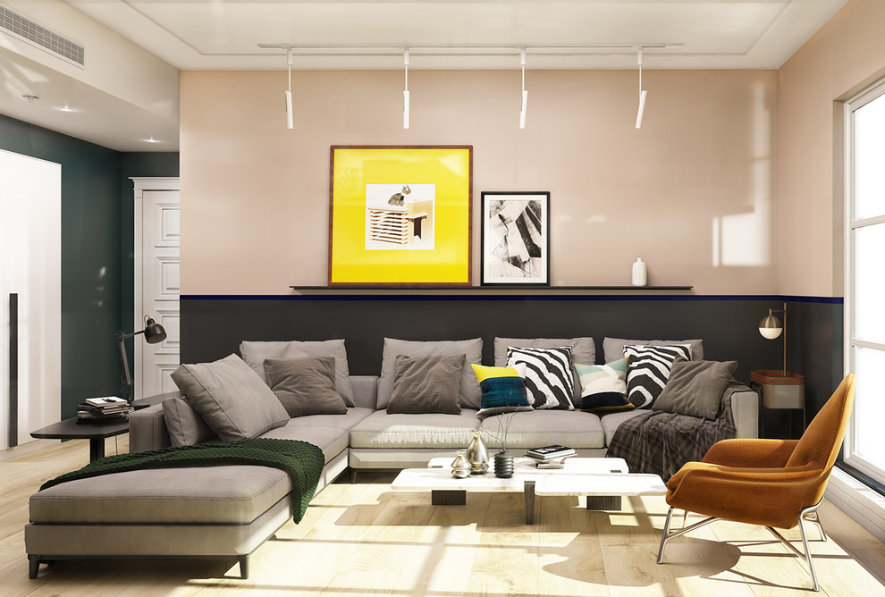 Пример оригинального дизайна: парадная, открытая гостиная комната среднего размера в стиле модернизм с розовыми стенами, светлым паркетным полом и бежевым полом без камина, телевизора