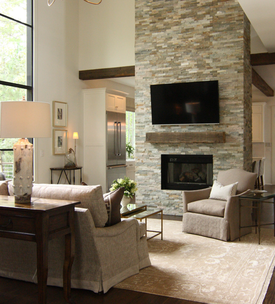 Design ideas for a medium sized modern formal open plan living room in Atlanta with beige walls, dark hardwood flooring, brown floors and feature lighting.