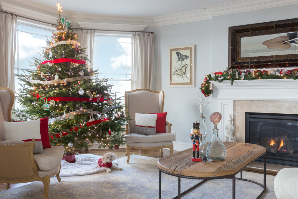 Inspiration for a large transitional enclosed and formal dark wood floor and brown floor living room remodel in Newark with blue walls, a standard fireplace, a stone fireplace and no tv