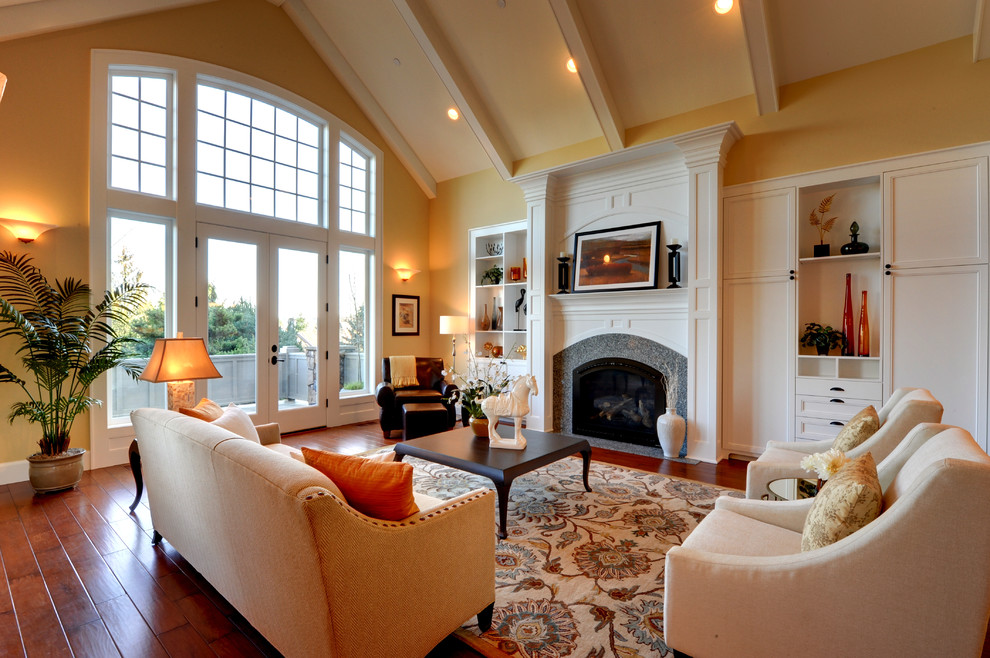 Inspiration for a contemporary living room in Portland with yellow walls and a standard fireplace.