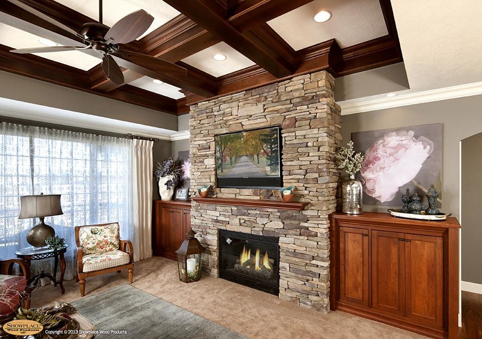 Inspiration for a small transitional open concept living room remodel in Nashville with gray walls, a standard fireplace, a stone fireplace and a wall-mounted tv