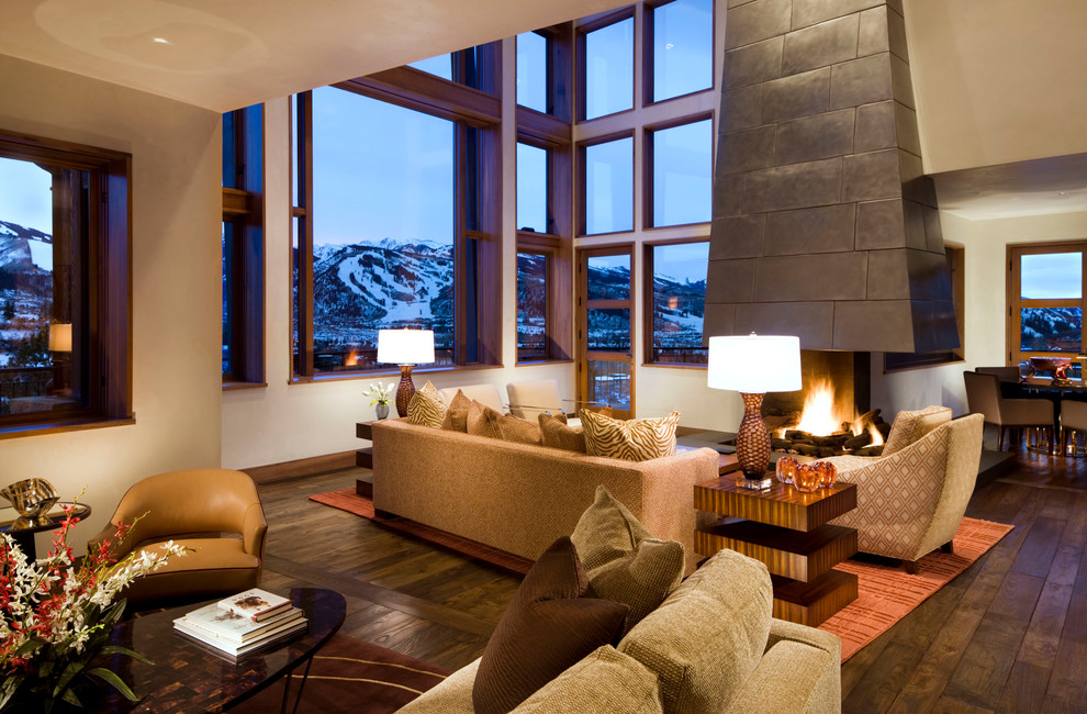 Trendy formal and open concept living room photo in Denver with a corner fireplace