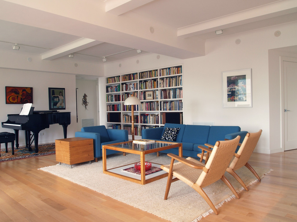 Idee per un grande soggiorno minimalista con sala della musica e pareti bianche