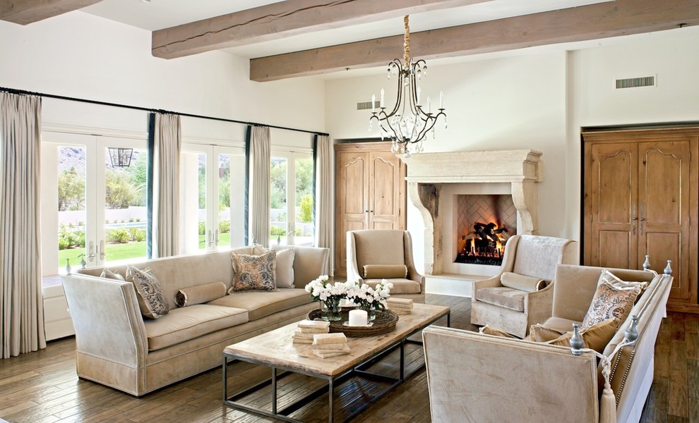 Design ideas for a traditional living room in Phoenix with white walls.