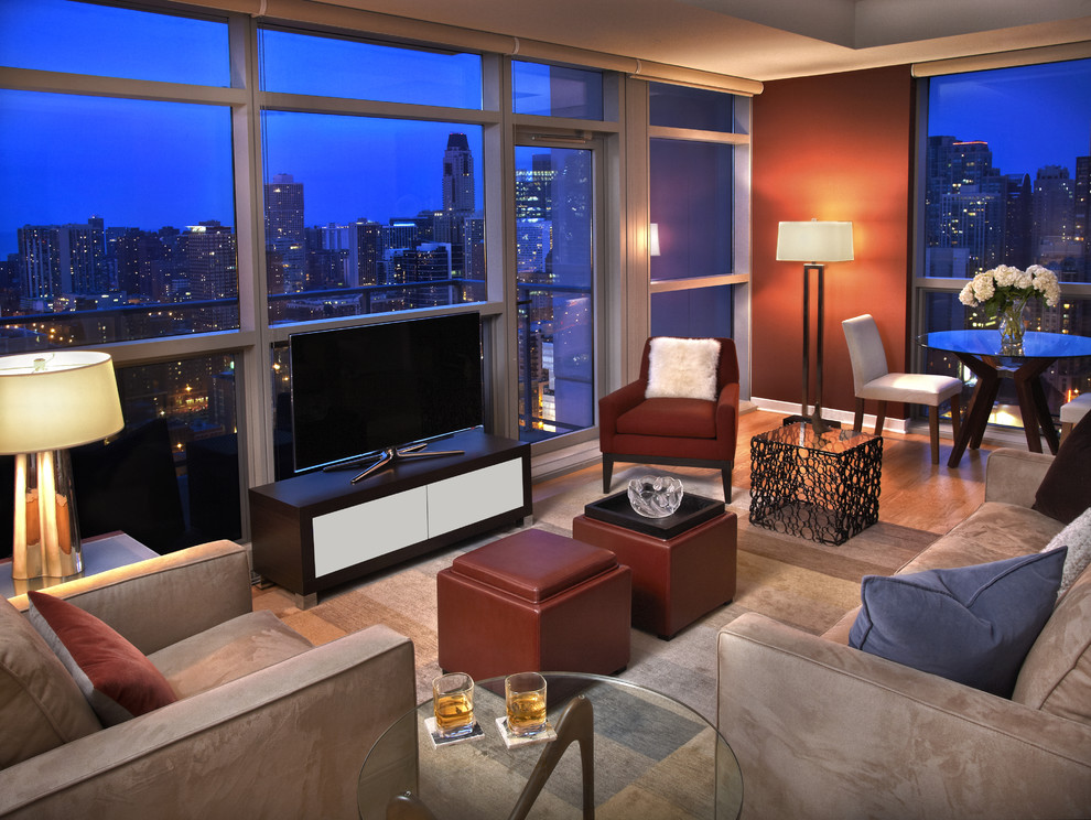 Idee per un grande soggiorno minimalista con pareti rosse e TV autoportante