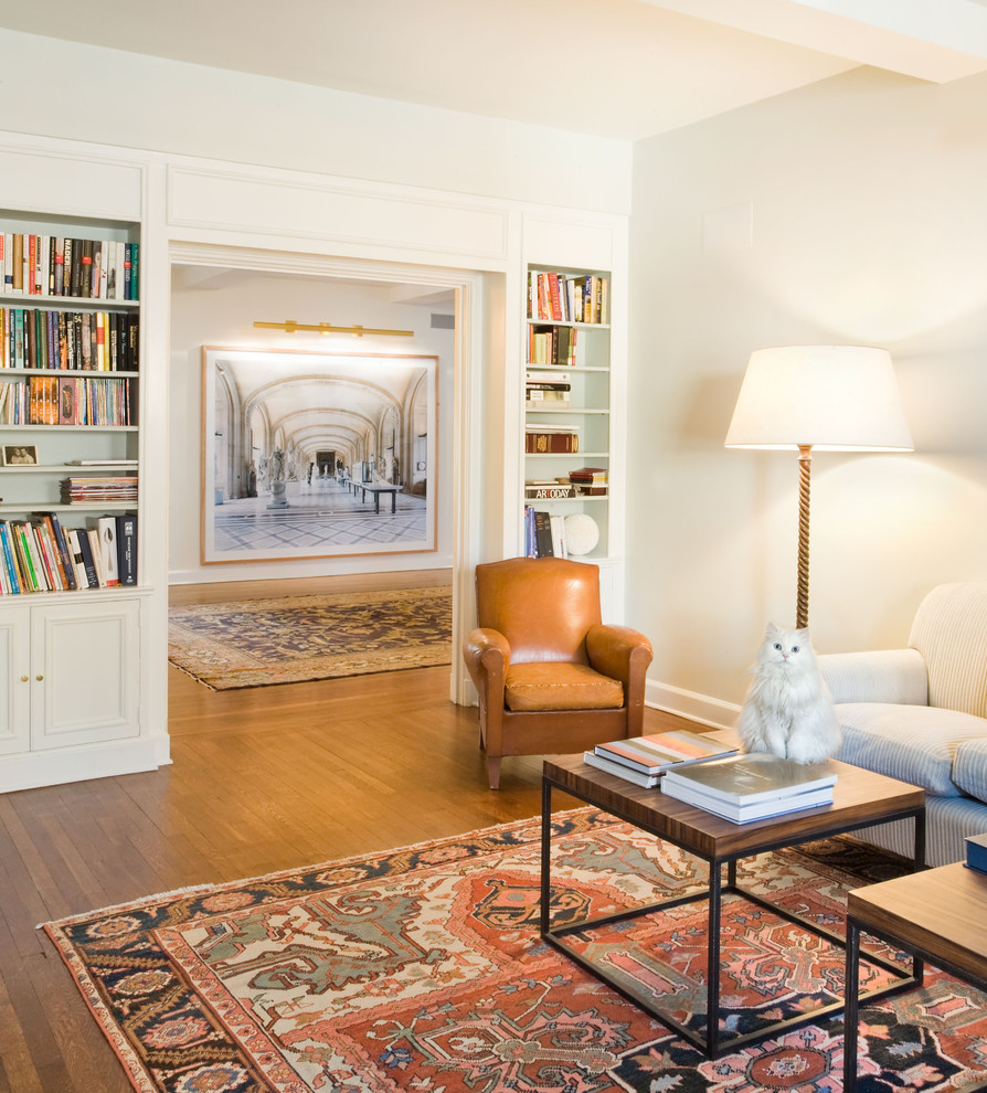 Living room library - traditional living room library idea in New York