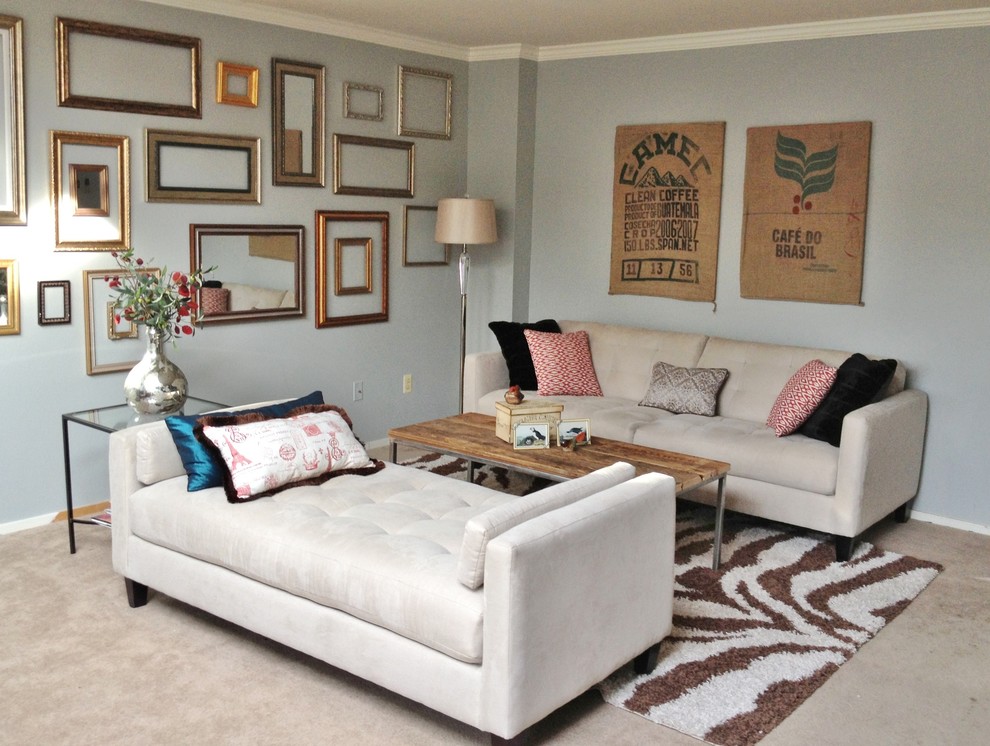 Example of a mid-sized trendy formal and enclosed living room design in Denver with blue walls, no fireplace and no tv