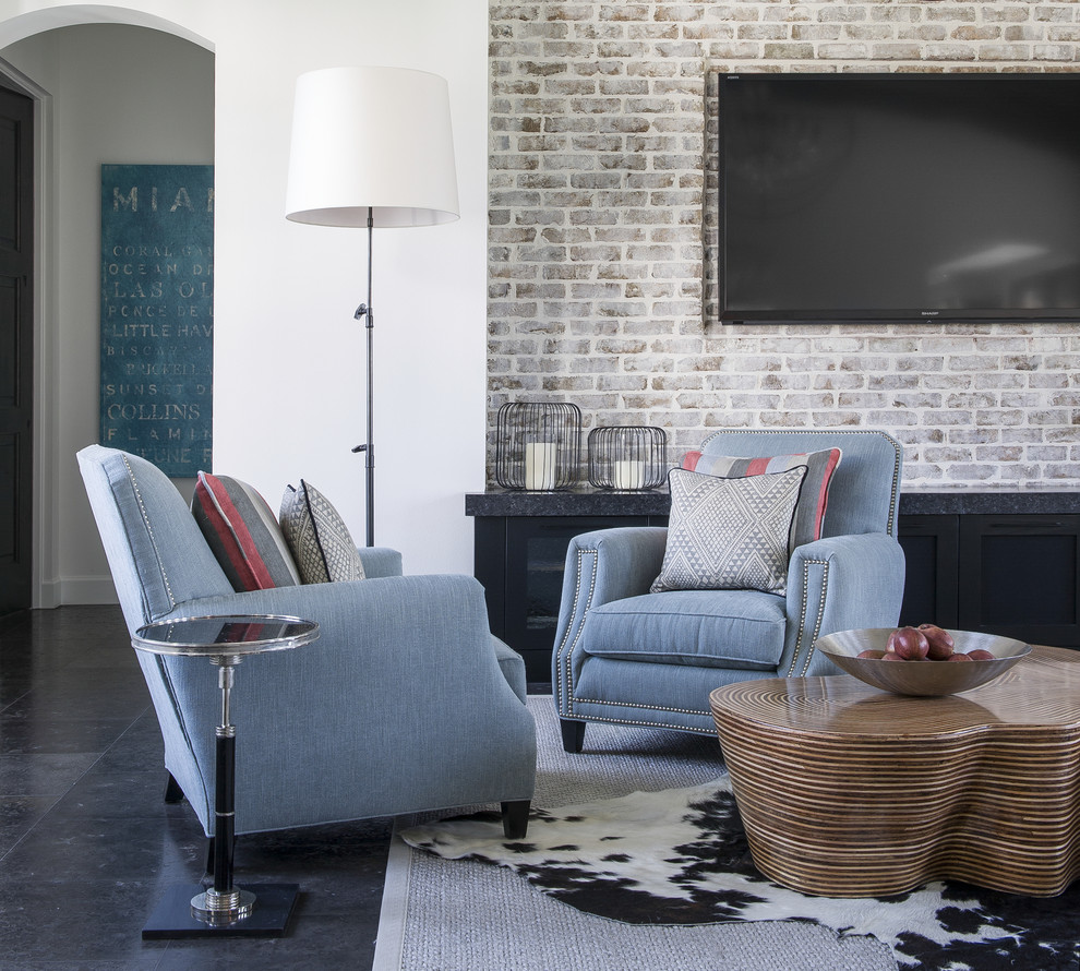 Example of a large eclectic formal and open concept limestone floor living room design in Orlando with white walls and a wall-mounted tv