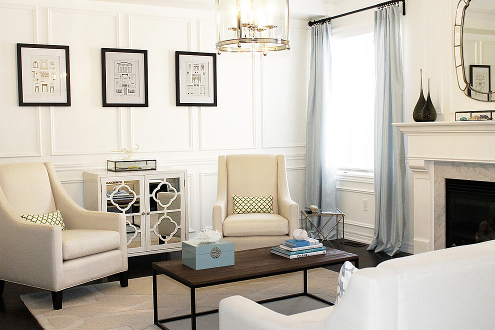 Inspiration for a mid-sized contemporary living room remodel in Toronto with white walls and a standard fireplace