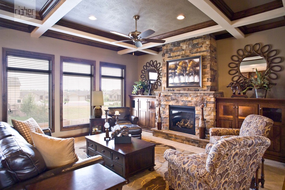 Example of a mid-sized mountain style open concept and formal carpeted and beige floor living room design in Other with beige walls, a standard fireplace, a stone fireplace and no tv
