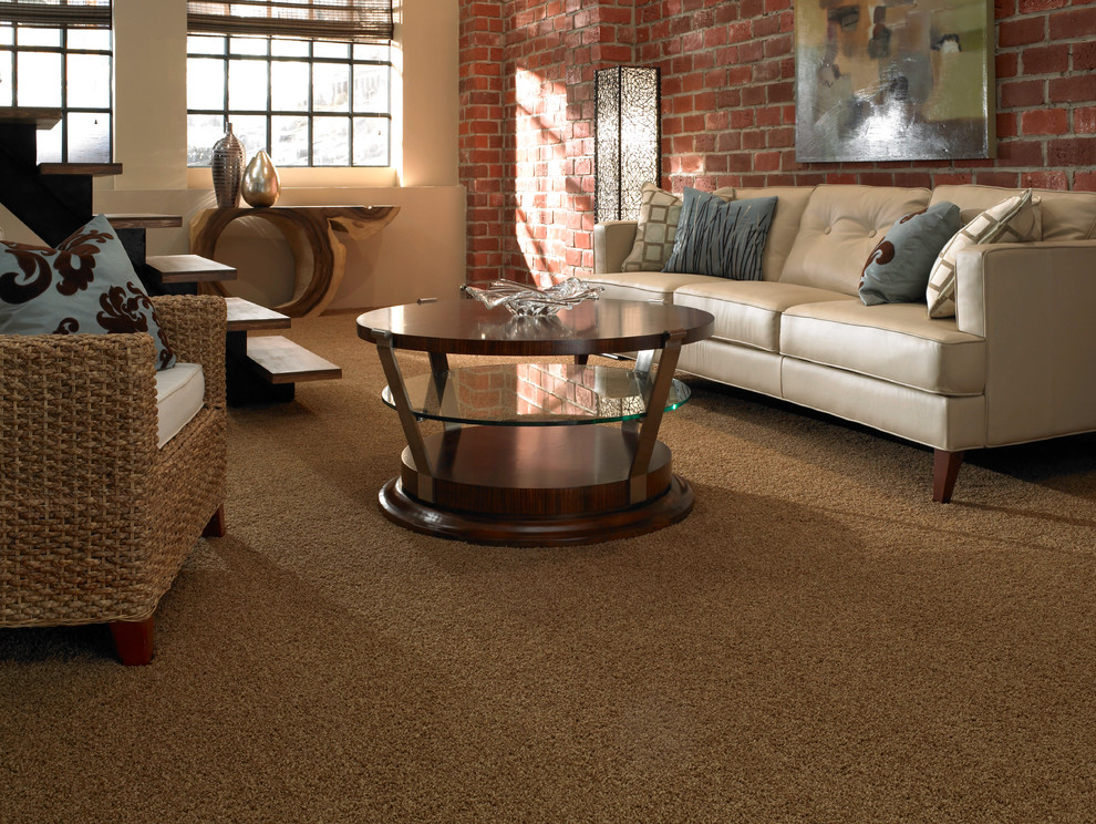 Inspiration for a shabby-chic style living room in Jacksonville with carpet.