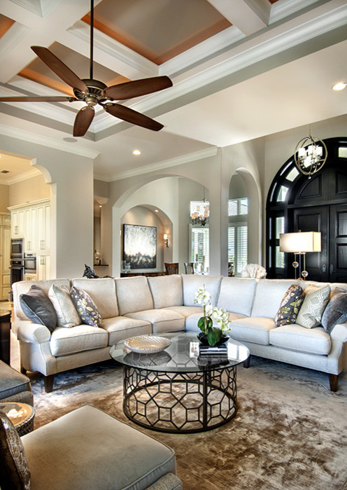 Inspiration for a traditional open plan living room in Tampa with grey walls.