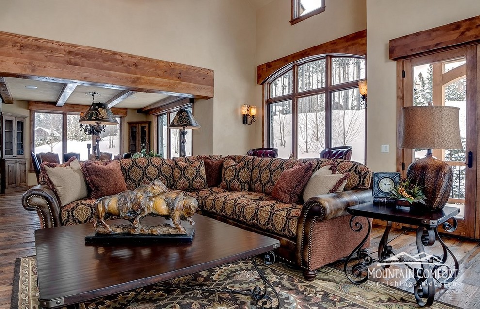 Example of a tuscan living room design in Denver