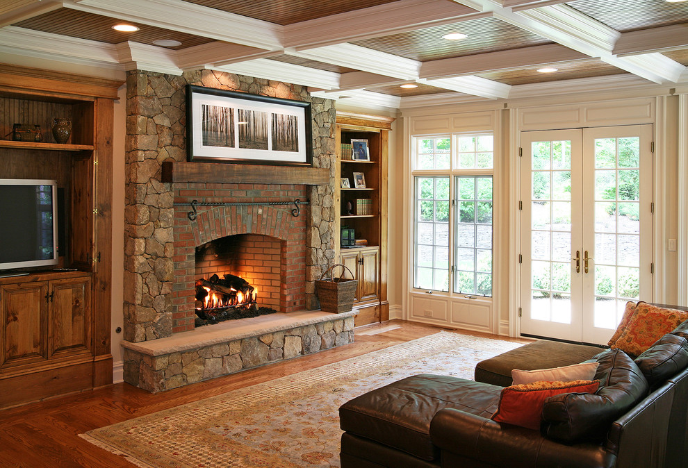 Inspiration for a classic living room in Other with a brick fireplace surround.