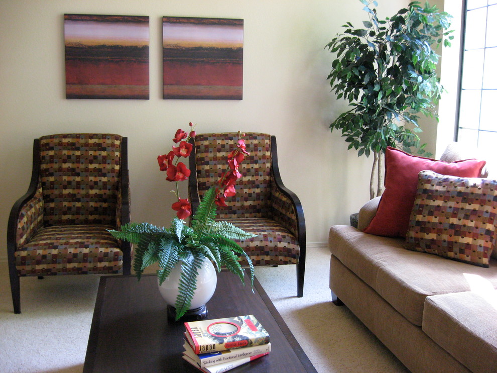 Small eclectic carpeted and brown floor living room photo in Albuquerque with beige walls