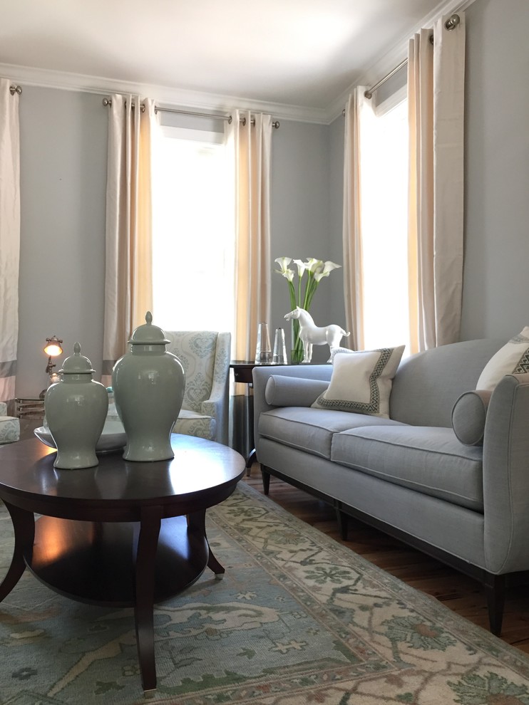 На фото: парадная, изолированная гостиная комната среднего размера в стиле неоклассика (современная классика) с серыми стенами и паркетным полом среднего тона без камина, телевизора