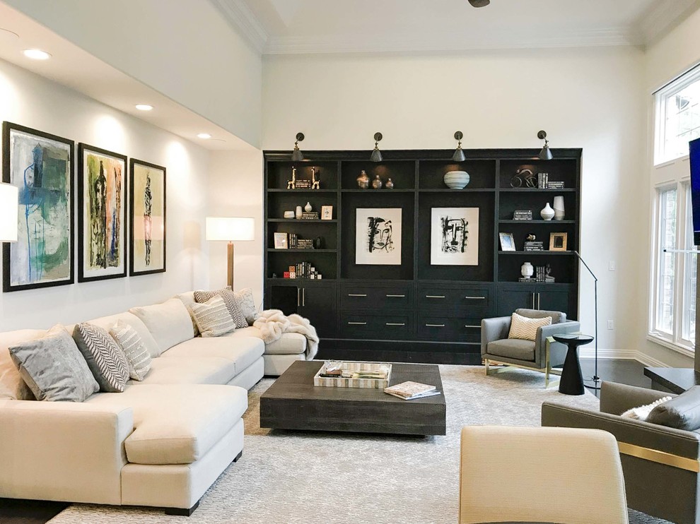 Immagine di un grande soggiorno contemporaneo aperto con pareti bianche e parquet scuro
