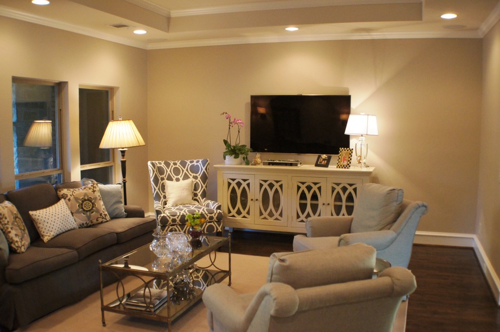 Photo of a medium sized classic enclosed living room in Dallas with beige walls, dark hardwood flooring and a wall mounted tv.