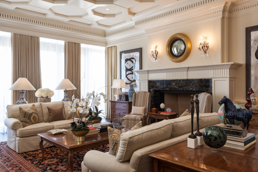 Inspiration for a large classic formal enclosed living room in Los Angeles with beige walls, dark hardwood flooring, a standard fireplace, a stone fireplace surround and no tv.