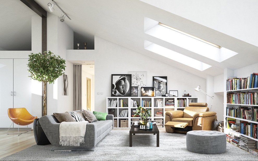 Inspiration for a large scandinavian open concept light wood floor and gray floor living room library remodel in Orange County with white walls, no fireplace and no tv
