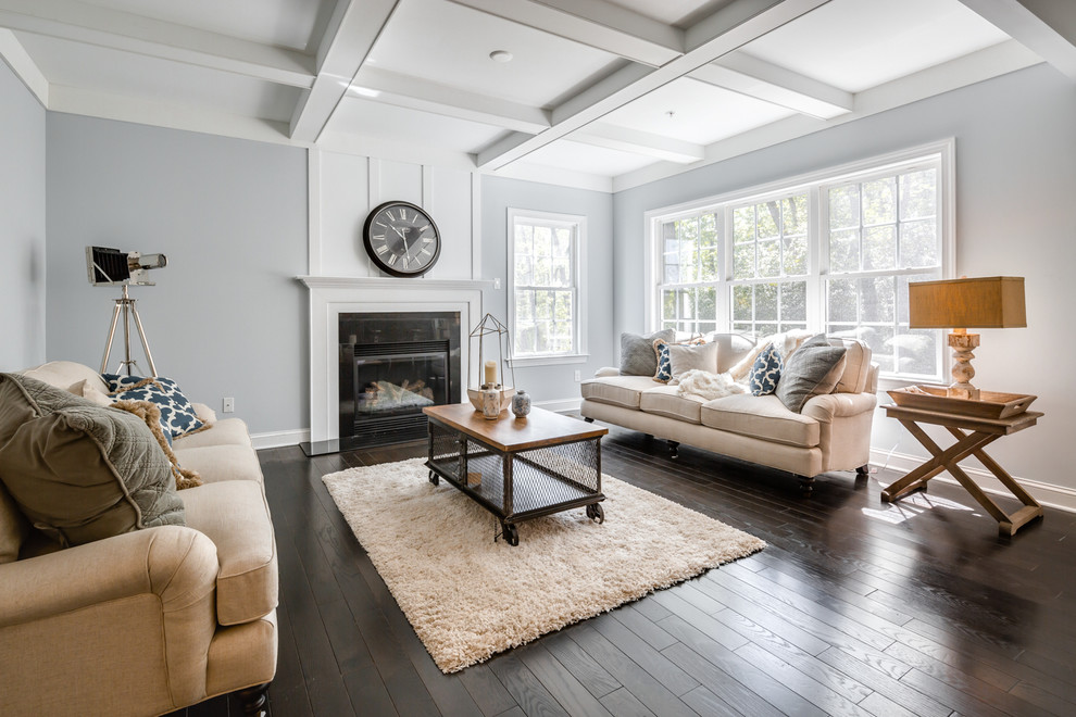 Example of a mid-sized cottage formal and open concept dark wood floor living room design in Philadelphia with gray walls, a standard fireplace and a stone fireplace