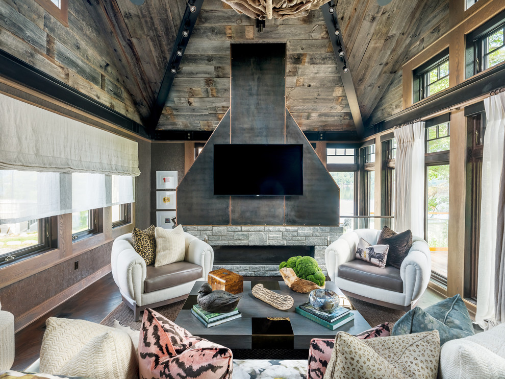 Photo of a rustic formal open plan living room with brown walls, dark hardwood flooring, a ribbon fireplace, a metal fireplace surround, a wall mounted tv and brown floors.