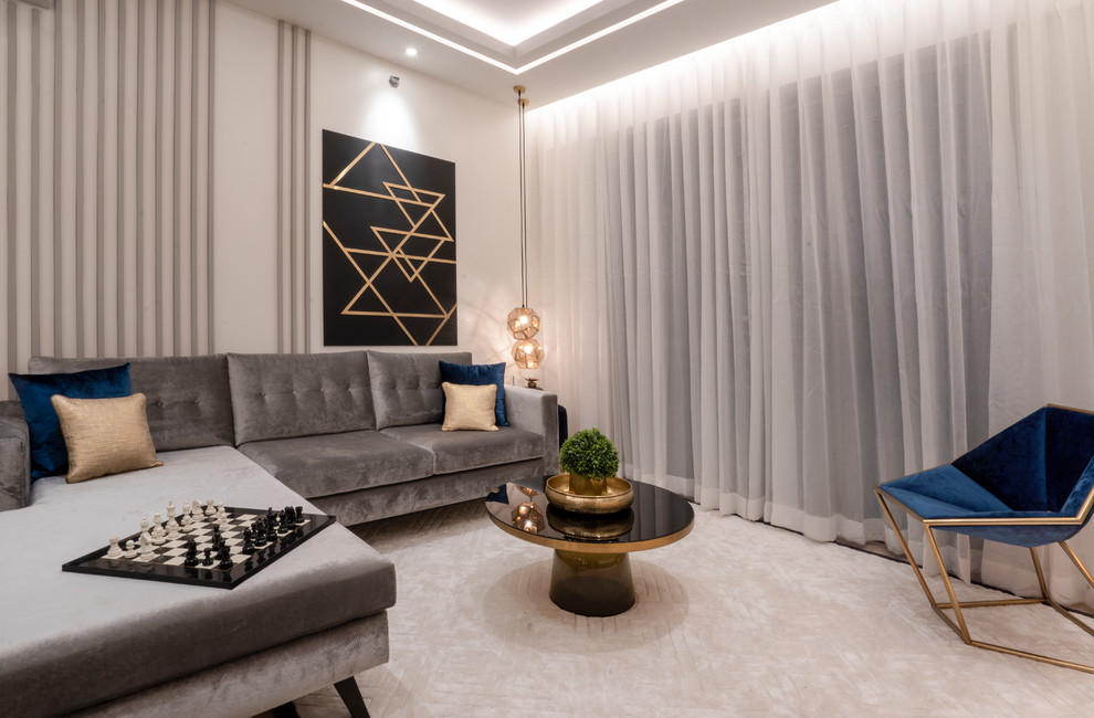 Идея дизайна: парадная гостиная комната в современном стиле с белыми стенами, ковровым покрытием и бежевым полом