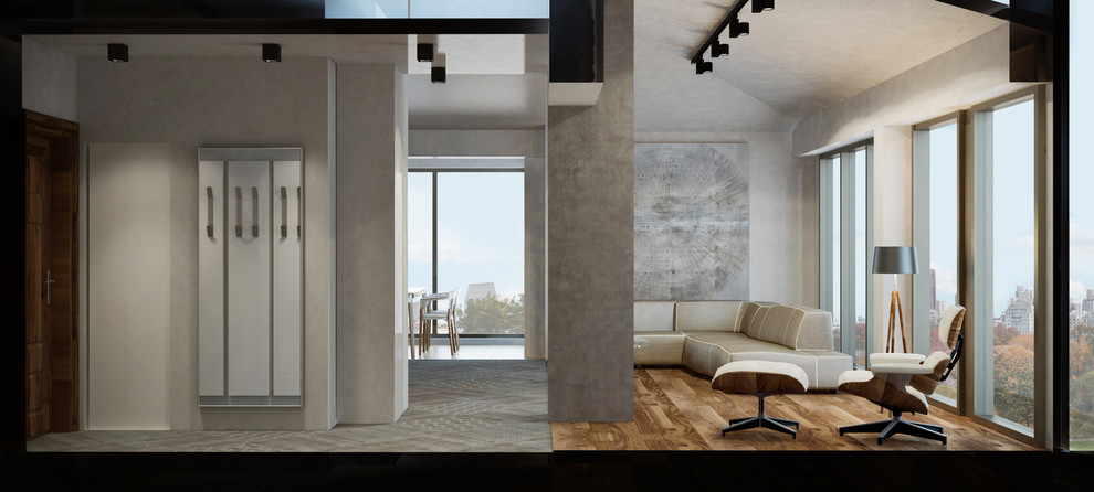 This is an example of an expansive urban open plan living room in London with a home bar, white walls, light hardwood flooring, no fireplace and a wall mounted tv.