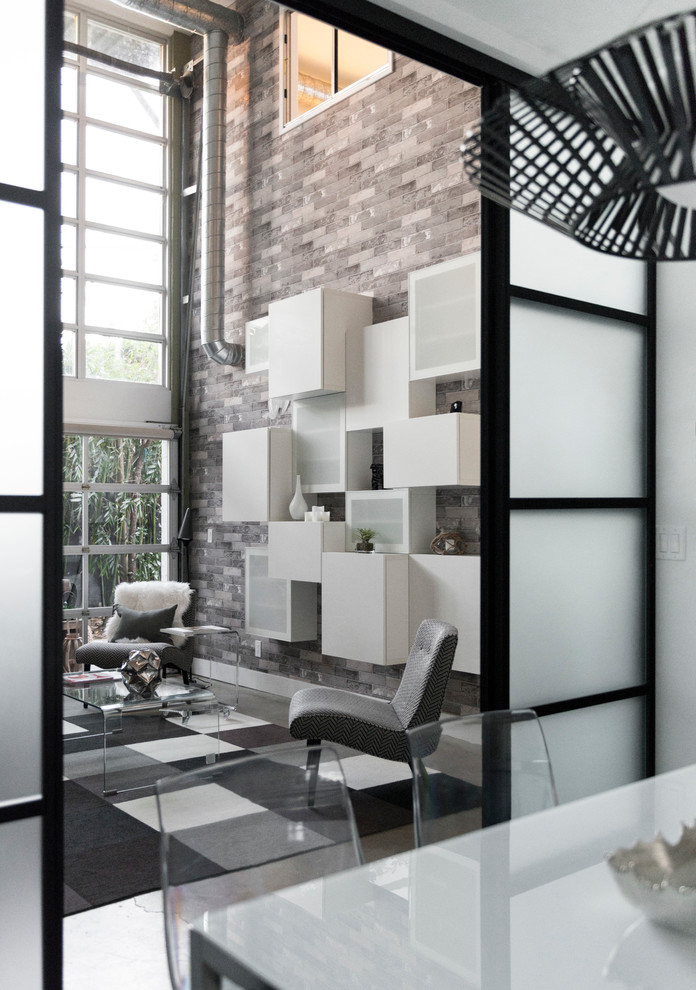 Inspiration för ett mellanstort funkis loftrum, med grå väggar och betonggolv