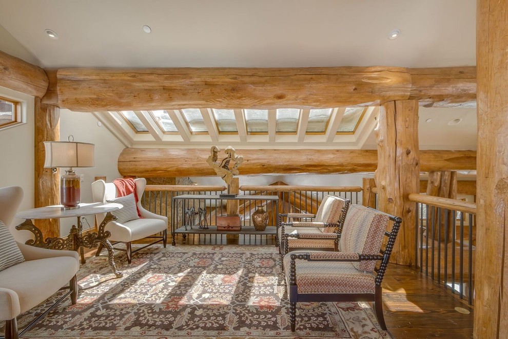Photo of a medium sized rustic formal mezzanine living room in Other with white walls, medium hardwood flooring, no fireplace, no tv and brown floors.