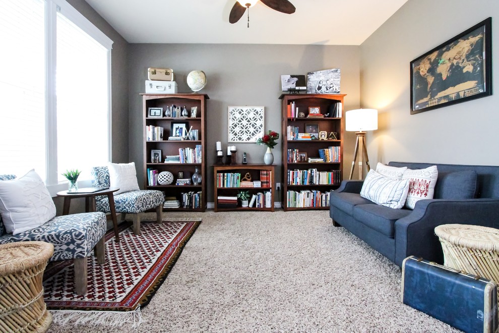 Living room library - small eclectic open concept carpeted and beige floor living room library idea in Seattle with brown walls, no fireplace and no tv