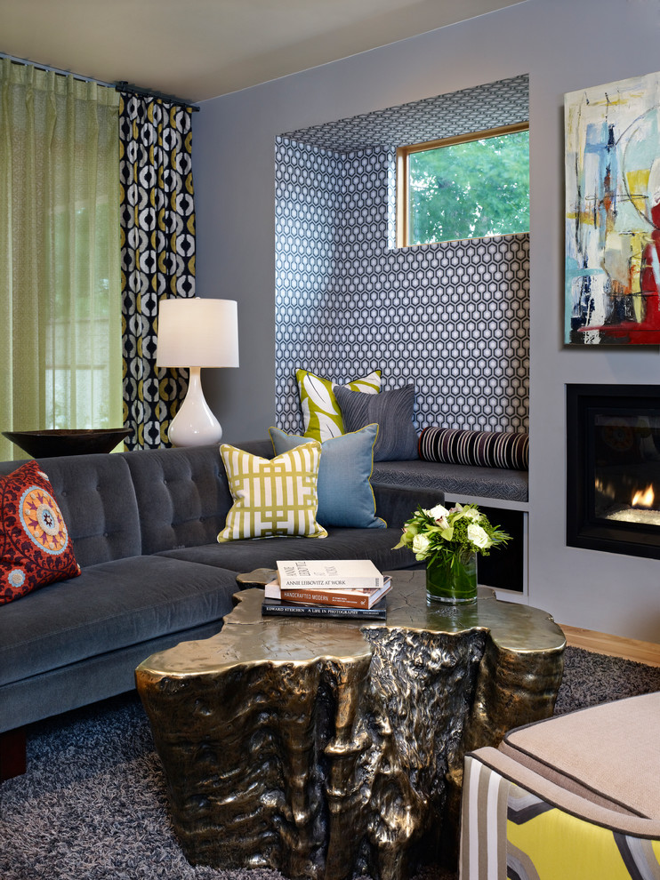 Eclectic living room photo in Denver with gray walls