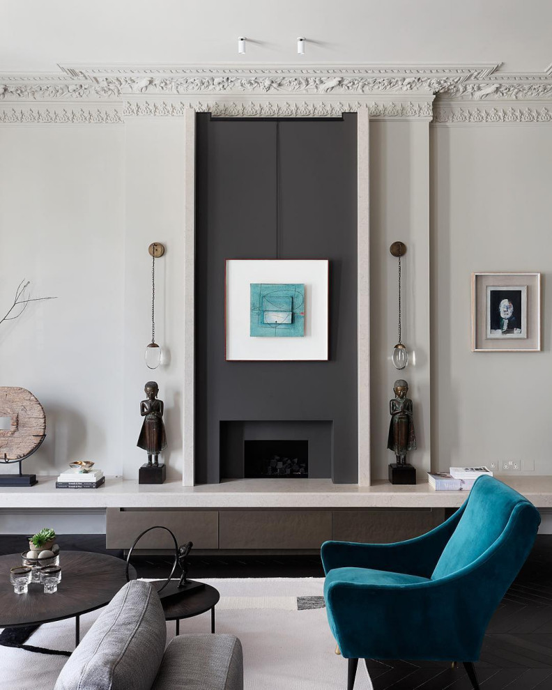 Photo of a contemporary grey and teal living room in London.