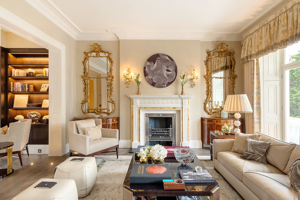 Aménagement d'un salon classique de taille moyenne avec une salle de réception, un mur beige, parquet foncé, une cheminée standard et un sol marron.