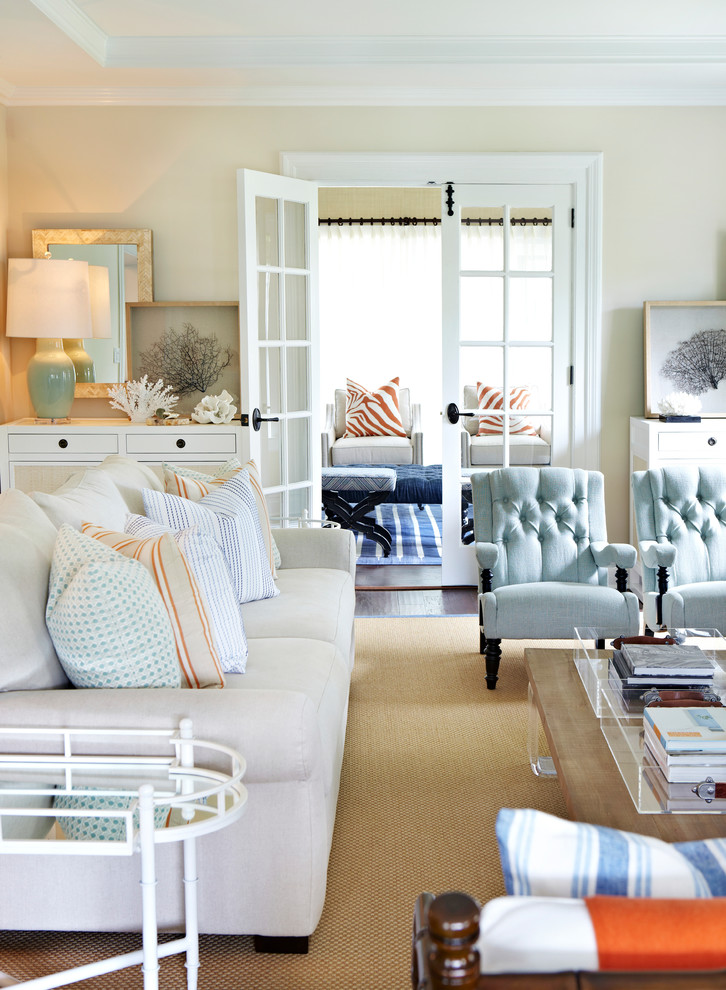 Photo of a nautical formal enclosed living room in New York with beige walls and dark hardwood flooring.