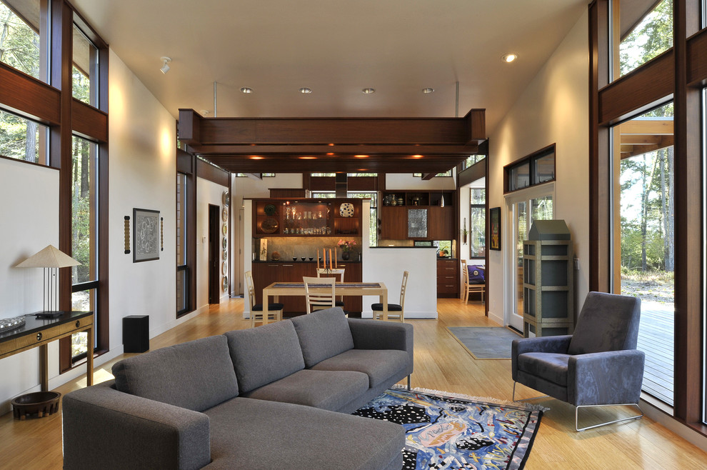 Living room - contemporary open concept living room idea in Seattle with beige walls