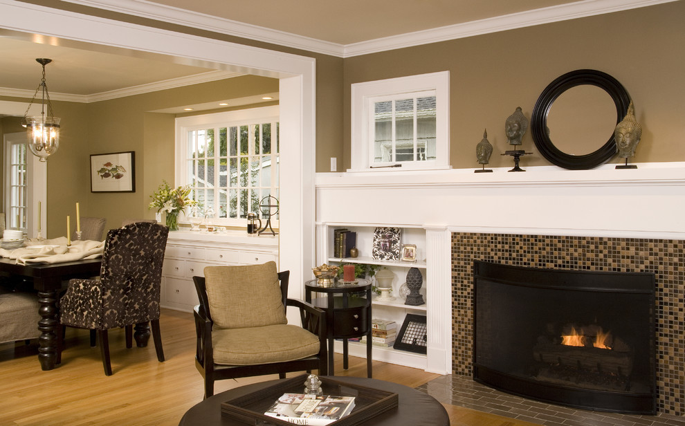 Elegant living room photo in Seattle with a tile fireplace