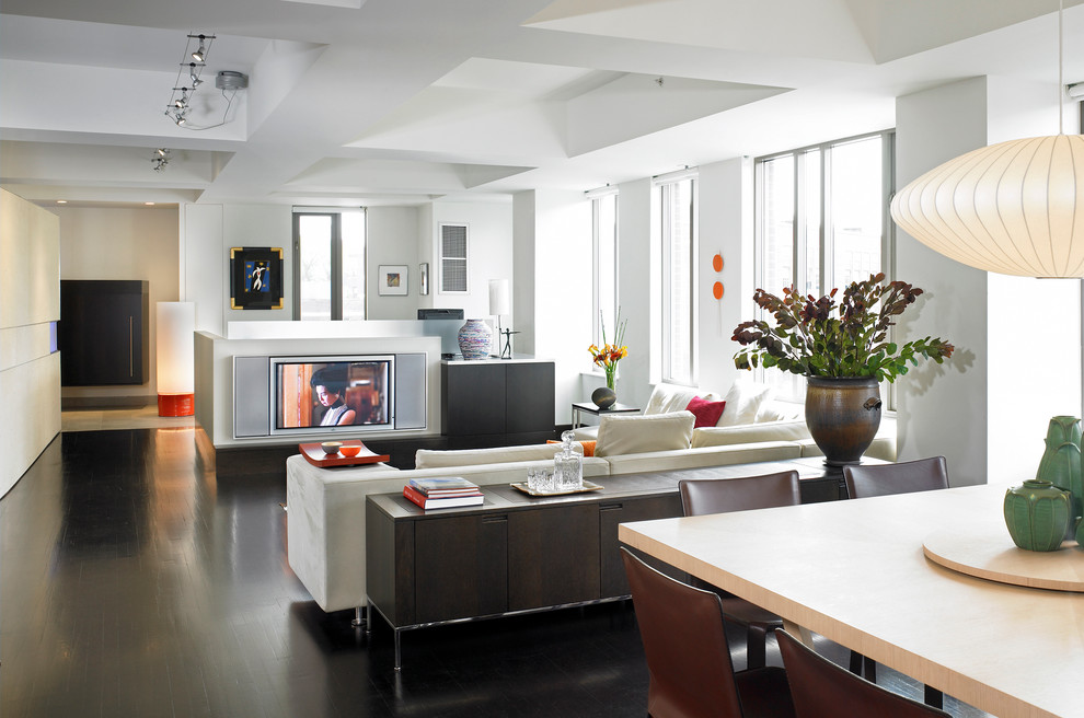 Contemporary open plan living room in Boston with white walls and a built-in media unit.